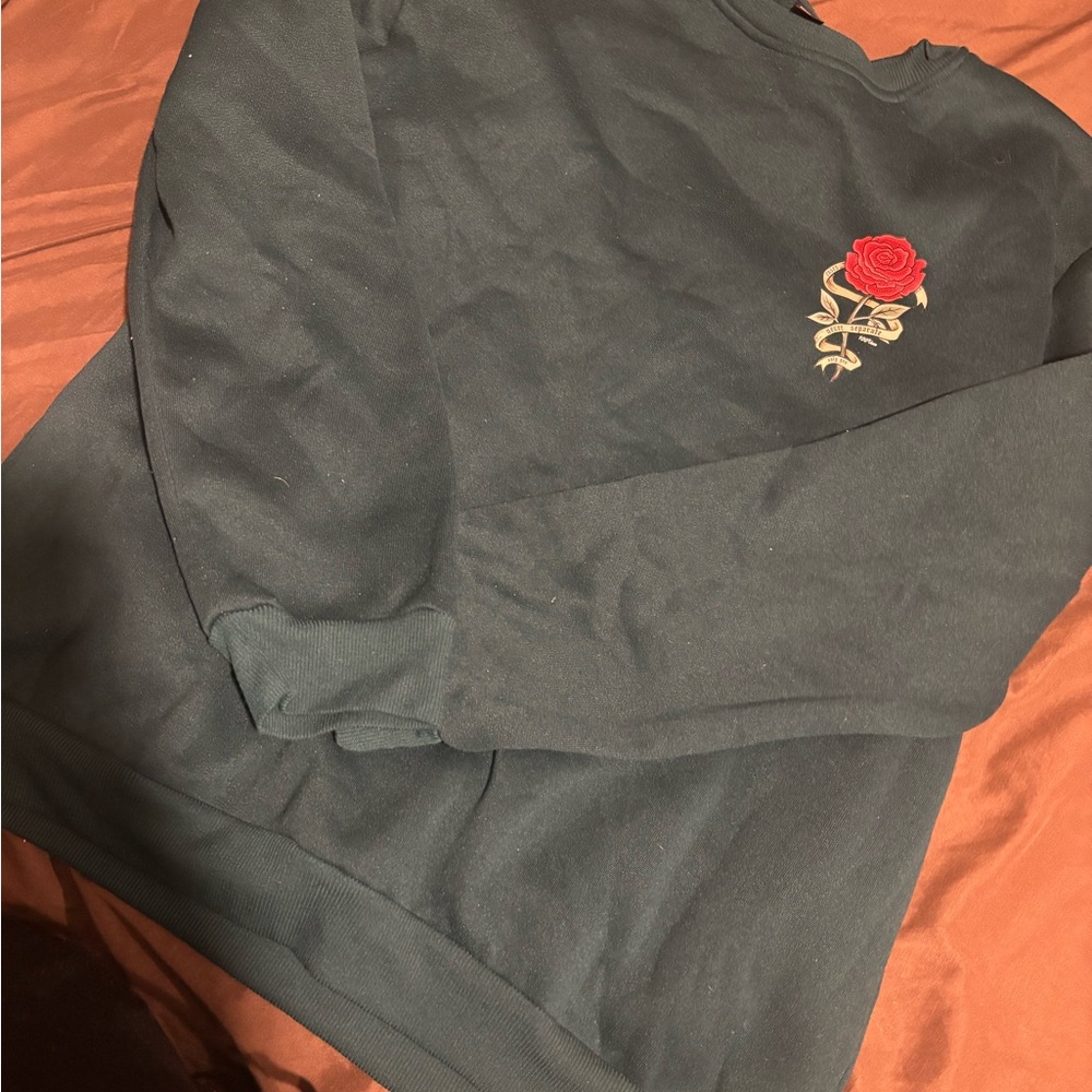 Elegant Black Crewneck Sweater with Rose Embroidery